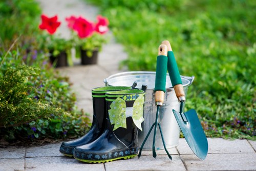 Professional landscaper working on a garden design in Heston