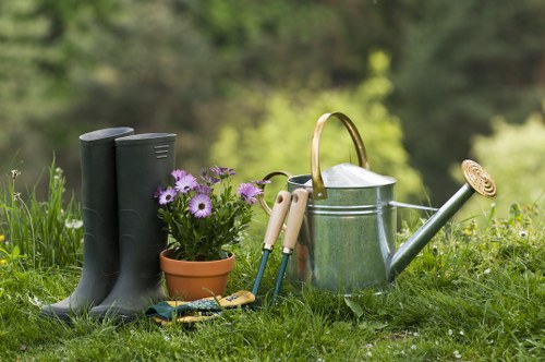 Garden workers removing debris